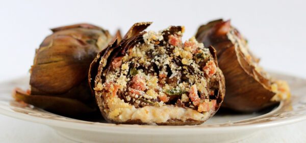 Cuori di carciofi saltati con prosciutto e formaggio